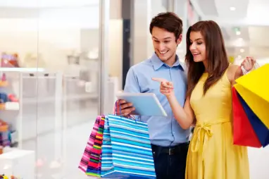 Happy couple shopping at a fresh mart grocery close to you
